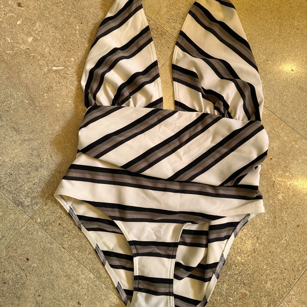 Bathing suits from Eres and Norma Kamali
